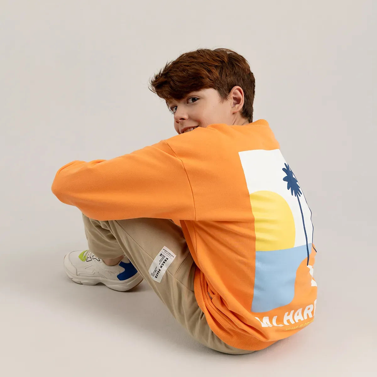 Buzo para niño oversize con estampado en espalda